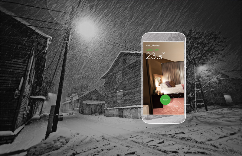 Una calle nevada y un teléfono móvil que marca la temperatura del interior de una habitación. 
