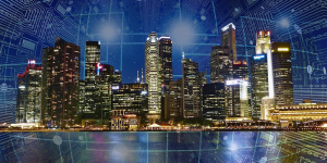 Un conjunto de edificios inteligentes con una red de fondo ilustrando la conectividad de los edificios.